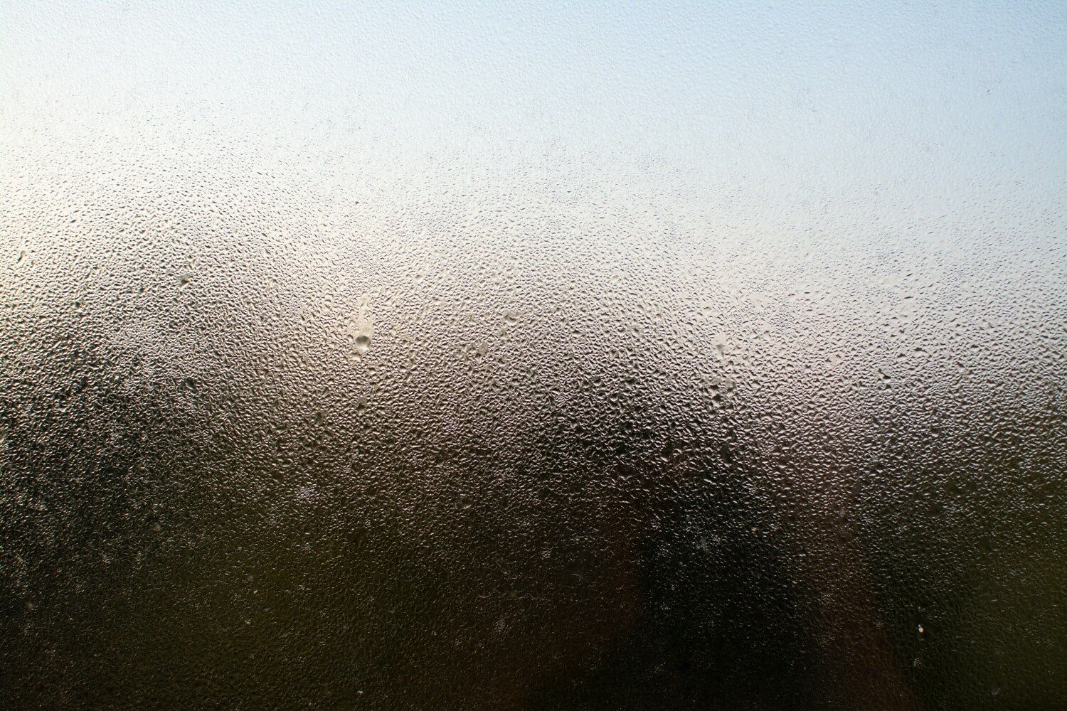 closeup-shot-misty-window-with-water-droplets